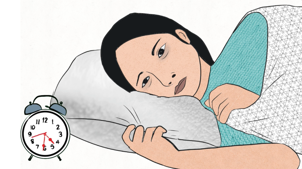 Woman lying awake at night holding a pillow with an alarm clock beside her, showing stress-related insomnia and sleep problems.